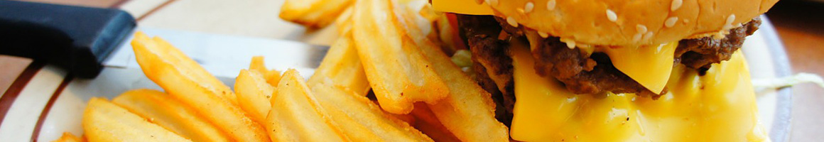 Eating American (Traditional) Burger at Blue Sky restaurant in Abilene, TX.